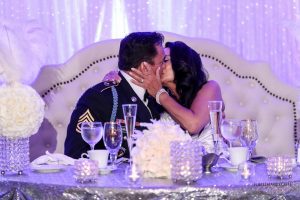 Astoria Banquets, Wedding Venue, Best of Banquets Halls, Wedding Wire, Knot, Event Space, Chicago and Suburbs, sweetheart table, happy couple kissing