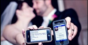 Guests Interacting With Each Other Via Social Media During A Wedding