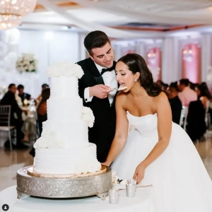 All-inclusive wedding reception in elegant indoor ballroom with chandeliers and spacious dance floor at Chicago venue.